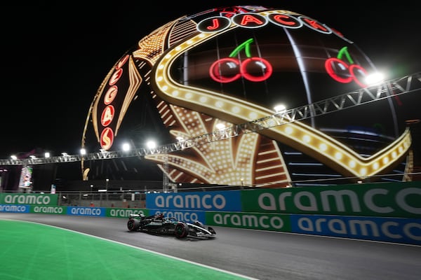 Mercedes driver George Russell, of Britain, drives during qualifications for the Formula One U.S. Grand Prix auto race, Friday, Nov. 22, 2024, in Las Vegas. (AP Photo/Rick Scuteri)