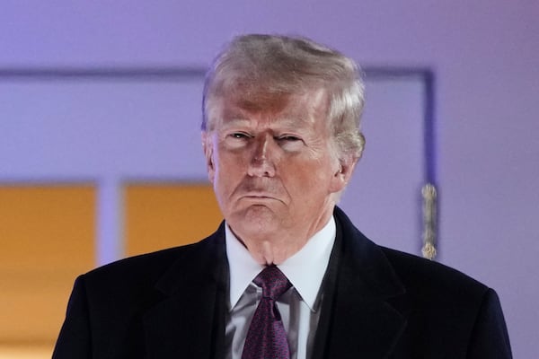 President-elect Donald Trump watches fireworks at Trump National Golf Club in Sterling, Va., Saturday, Jan. 18, 2025, ahead of the 60th Presidential Inauguration. (AP Photo/Matt Rourke)