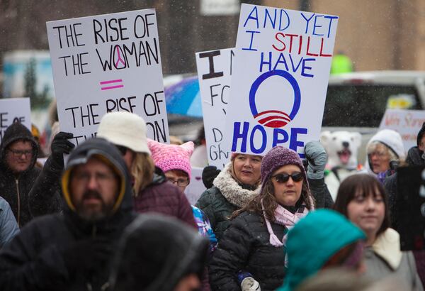 FILE - Protesters wave signs and chant during a Women's March, Jan. 20, 2018, in Casper, Wyo. (Josh Galemore/The Casper Star-Tribune via AP, File)