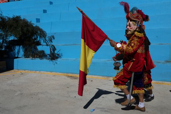 Dancers perform The Dance of the Conquest of Guatemala, depicting Spain's 1524 invasion of the K'iche' kingdom in Tejutla, in Guatemala's San Marcos department, on the feast day of the Black Christ of Esquipulas, Wednesday, Jan. 15, 2025. (AP Photo/Moises Castillo)