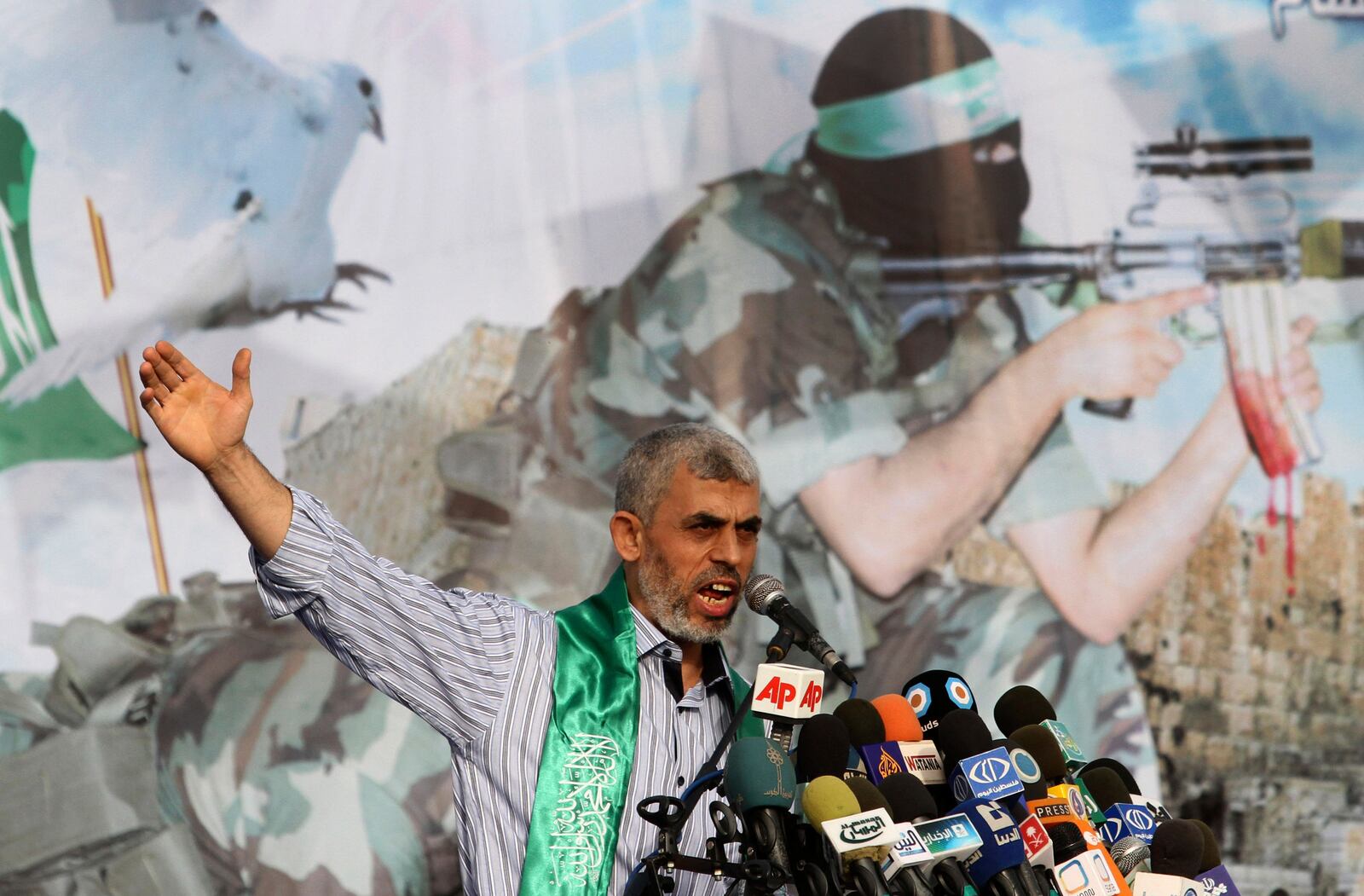 File - In this Oct. 21, 2011, file photo, Yahya Sinwar, a founder of Hamas' military wing, talks during a rally in Khan Younis, southern Gaza Strip. (AP Photo/Hatem Moussa, File)