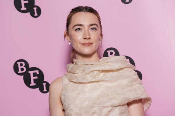 Saoirse Ronan poses for photographers upon arrival at the photo call for an 'In Conversation' event at the BFI Southbank, on Wednesday, Dec. 18, 2024, in London. (Photo by Scott A Garfitt/Invision/AP)