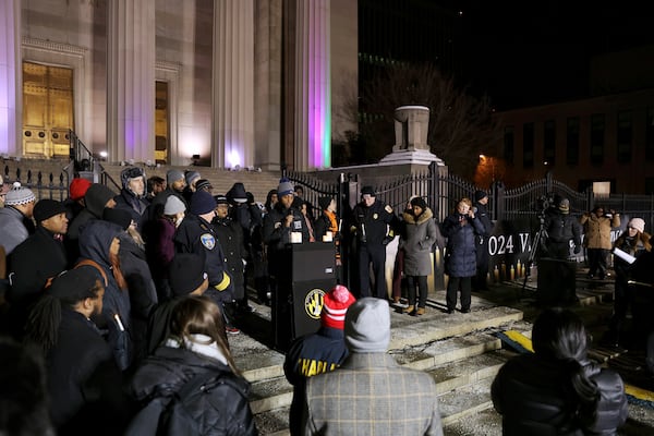 Baltimore Mayor Brandon Scott addresses attendees at the annual Vigil of Remembrance at War Memorial Plaza, Tuesday, Jan. 7, 2025, in Baltimore, Md., to honor the lives of Baltimoreans lost in 2024. (Wesley Lapointe/The Baltimore Banner via AP)