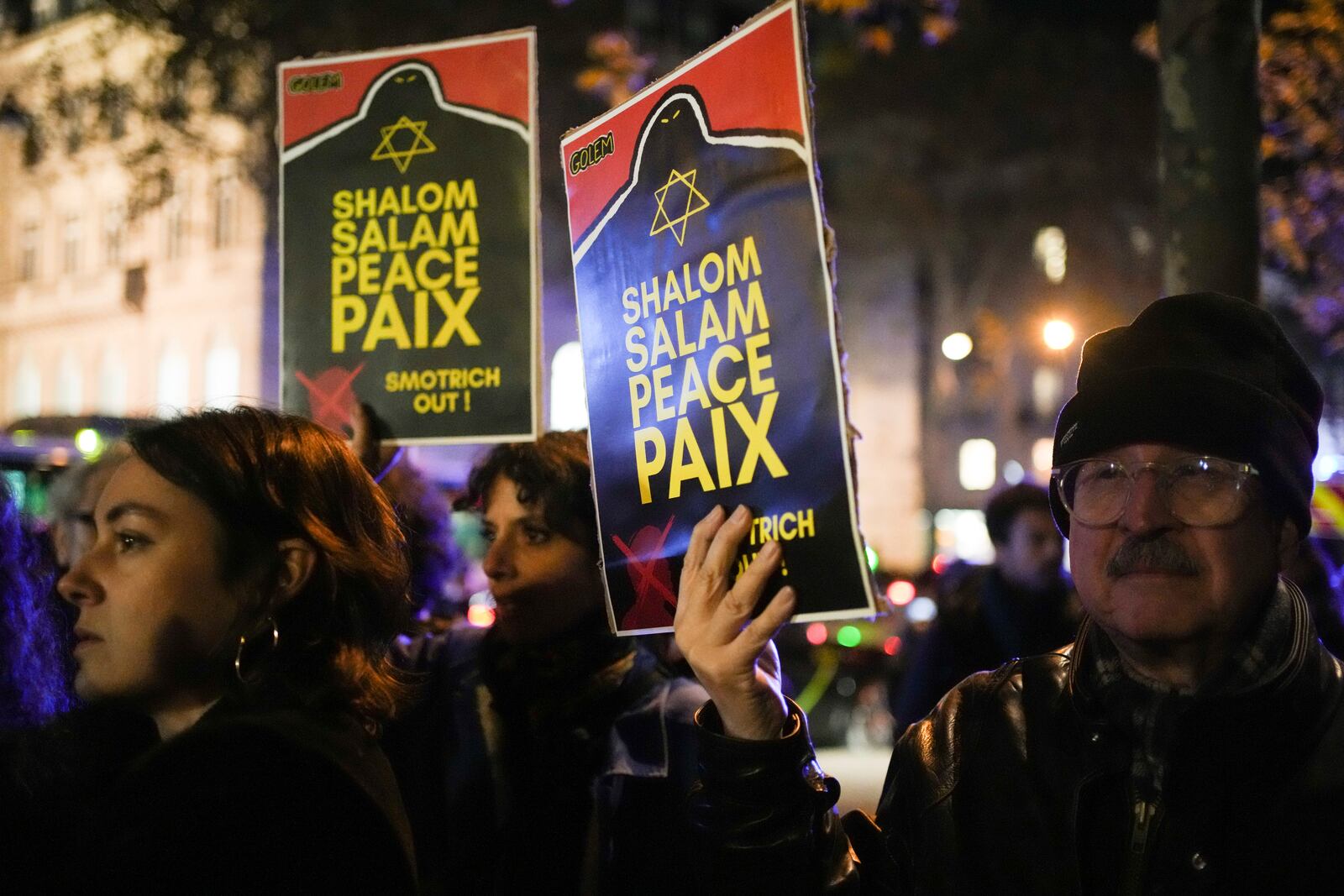 Protestors take part in a rally against the "Israel is Forever" gala organized by far-right Franco-Israeli figures, in Paris, Wednesday, Nov. 13, 2024, on the eve of the UEFA Nations League 2025 soccer match between France and Israel. (AP Photo/Christophe Ena)