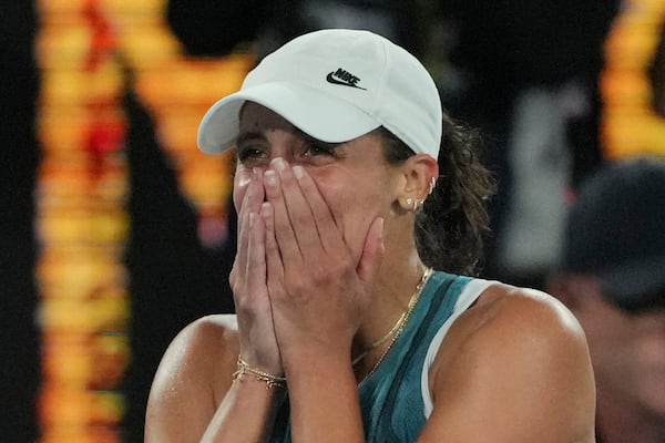 Madison Keys of the U.S. celebrates after defeating Aryna Sabalenka of Belarus during the women's singles final at the Australian Open tennis championship in Melbourne, Australia, Saturday, Jan. 25, 2025. (AP Photo/Vincent Thian)