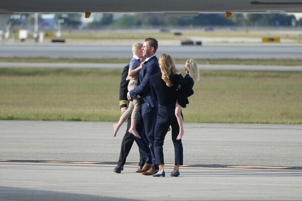 Eric Trump and his family arrive to board a private airplane at Palm Beach International Airport Saturday, Jan. 18, 2025 in West Palm Beach, Fla., for travel to Washington. (AP Photo/Lynne Sladky)