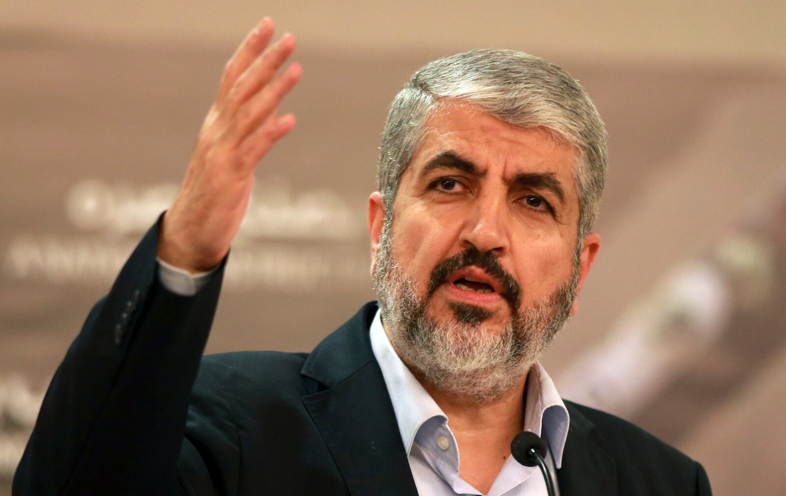 FILE - Khaled Mashaal, at the time, leader of the militant group Hamas that has governed Gaza since a 2007 takeover, speaks during a speech held in Doha, Qatar, on Aug. 28, 2014. (AP Photo/Osama Faisal, File)