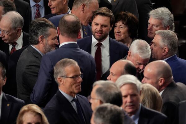 Republicans congratulate Vice President-elect JD Vance after a joint session of Congress convened to confirm the Electoral College votes, affirming President-elect Donald Trump's victory in the presidential election, Monday, Jan. 6, 2025, at the U.S. Capitol in Washington. (AP Photo/Manuel Balce Ceneta)