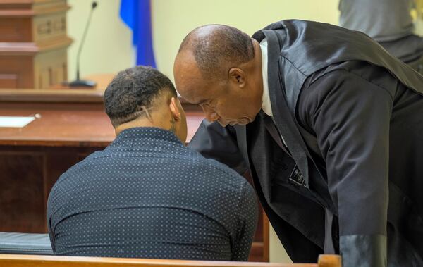 Tampa Bay Rays shortstop Wander Franco speaks to his lawyer Teodosio Jaquez during his trial on charges of sexually abusing a minor, sexual and commercial exploitation against a minor and human trafficking, at court in Puerto Plata, Dominican Republic, Thursday, Dec. 12, 2024. (AP Photo/Ricardo Hernandez)