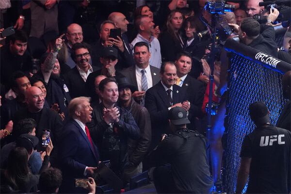 President-elect Donald Trump greets Jon Jones after he defeated Stipe Miocic at UFC 309 at Madison Square Garden, early Sunday, Nov. 17, 2024, in New York. (AP Photo/Evan Vucci)