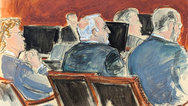 In this courtroom sketch, Fred Dabies, center, co-defendant of former Sen. Bob Menendez listens during his sentencing in Manhattan federal court, Wednesday, Jan. 29, 2025, in New York. (Elizabeth Williams via AP)