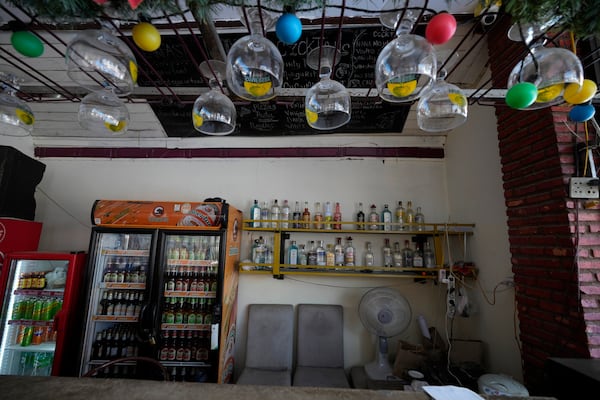 The empty bar of Nana Backpackers hostel in Vang Vieng, Laos, Friday, Nov. 22, 2024. (AP Photo/Anupam Nath)