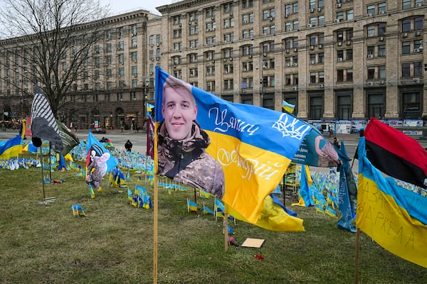 Flags wave at the memorial site for those killed during the war, in Independence Square in Kyiv, Ukraine, Saturday, Feb. 24, 2024. (AP Photo/Efrem Lukatsky)