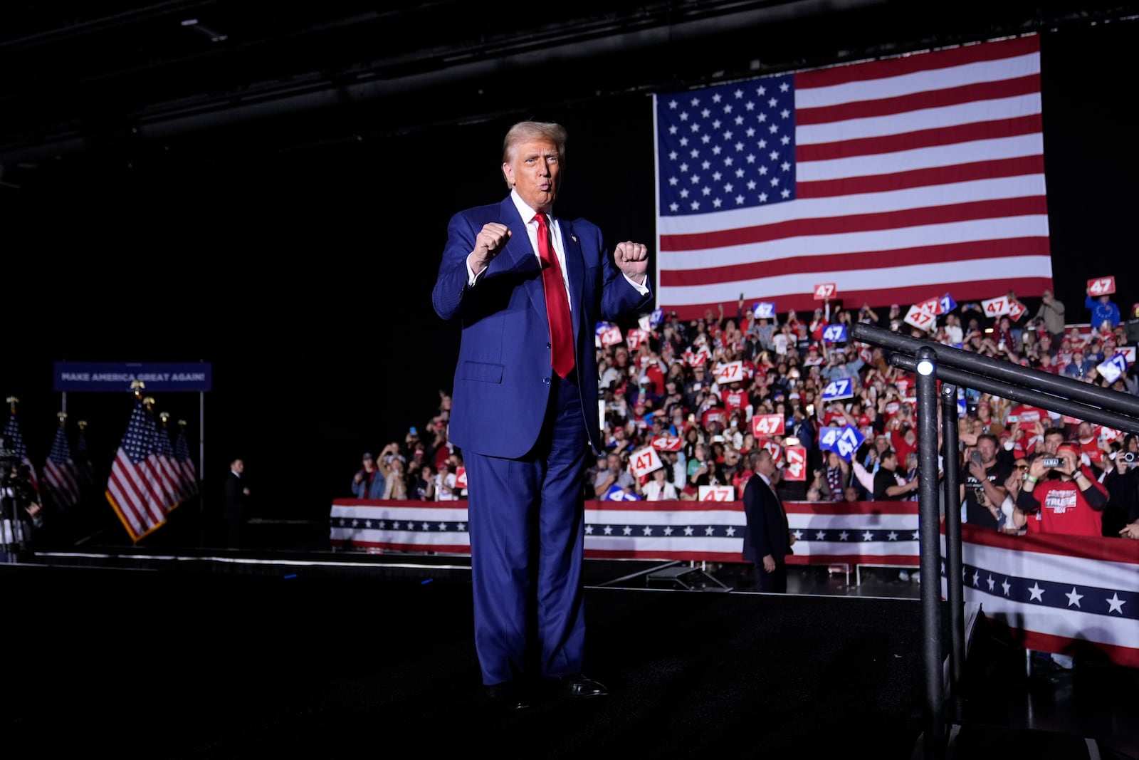 Republican presidential nominee former President Donald Trump departs after speaking during a campaign rally at the Suburban Collection Showplace, Saturday, Oct. 26, 2024, in Novi, Mich. (AP Photo/Alex Brandon)