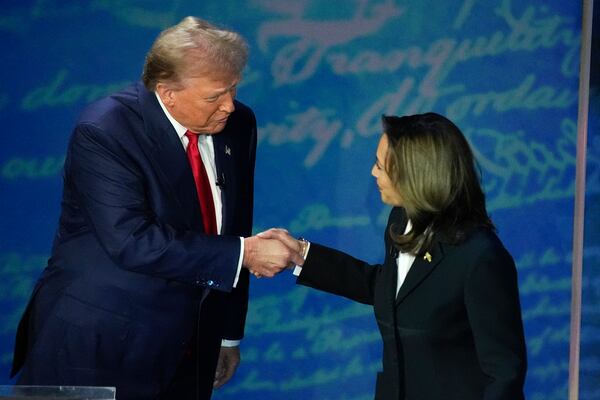 FILE - Republican presidential nominee former President Donald Trump, left, and Democratic presidential nominee Vice President Kamala Harris shake hands before the start of an ABC News presidential debate, Sept. 10, 2024, in Philadelphia. (AP Photo/Alex Brandon, File)