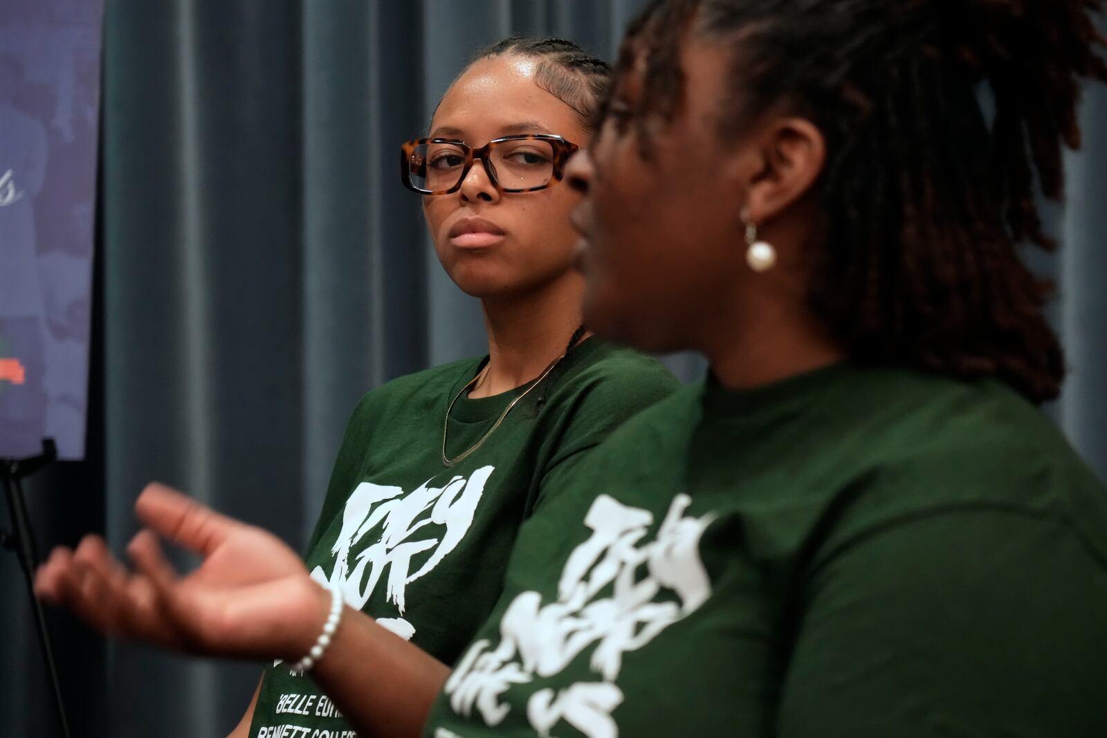 Bennett College student Jazmin Rawls, left, listens as Shelby Fogan, right, responds to a question during a roundtable in Greensboro, N.C., Tuesday, Oct. 8, 2024. (AP Photo/Chuck Burton)