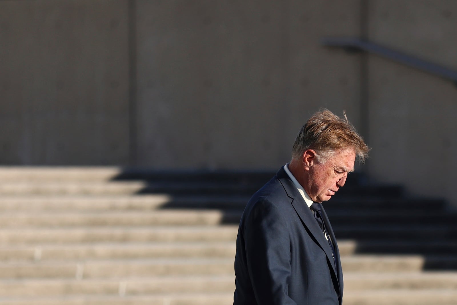 James Jacobson exits the federal courthouse after his arraignment on sex trafficking and interstate prostitution charges connected to the former CEO of Abercrombie & Fitch, Friday, Oct. 25, 2024, in Central Islip, N.Y. (AP Photo/Heather Khalifa)