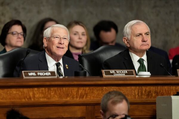 Committee chairman Sen. Roger Wicker, R-Miss.,left, and Sen. Jack Reed, D-R.I., the ranking member, right, open the Senate Armed Services Committee confirmation hearing for Pete Hegseth, President-elect Donald Trump's choice to be Defense secretary, at the Capitol in Washington, Tuesday, Jan. 14, 2025. (AP Photo/Ben Curtis)