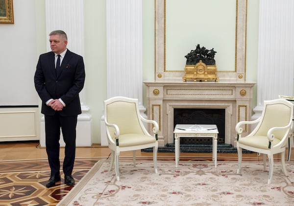 Slovak Prime Minister Robert Fico stands waiting for a meeting with Russian President Vladimir Putin at the Kremlin in Moscow, Sunday, Dec. 22, 2024. (Gavriil Grigorov, Sputnik, Kremlin Pool Photo via AP)