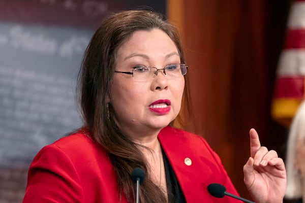 FILE - Sen. Tammy Duckworth, D-Ill., speaks during a press event on Capitol Hill, Feb. 27, 2024, in Washington. (AP Photo/Mark Schiefelbein, File)