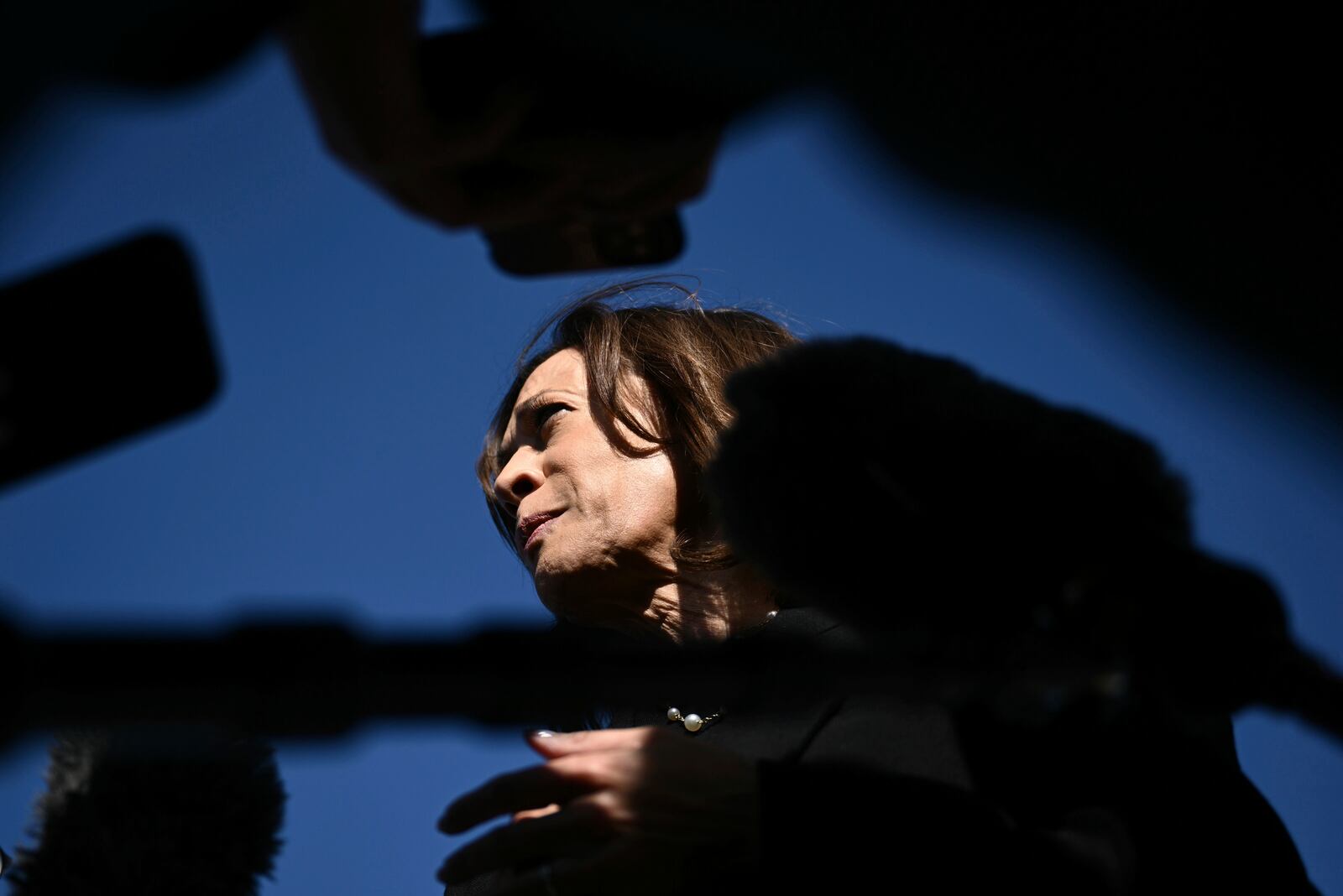 Democratic presidential nominee Vice President Kamala Harris talks to reporters before boarding Air Force Two, Wednesday, Oct. 30, 2024, at Joint Base Andrews, Md. (Brendan Smialowski/Pool via AP)