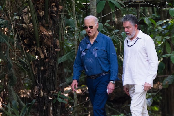 President Joe Biden, left, walks with Henrique Pereira, director of the National Institute for Research in the Amazon, during a tour of the Museu da Amazonia in Manaus, Brazil, Sunday, Nov. 17, 2024. (AP Photo/Manuel Balce Ceneta)