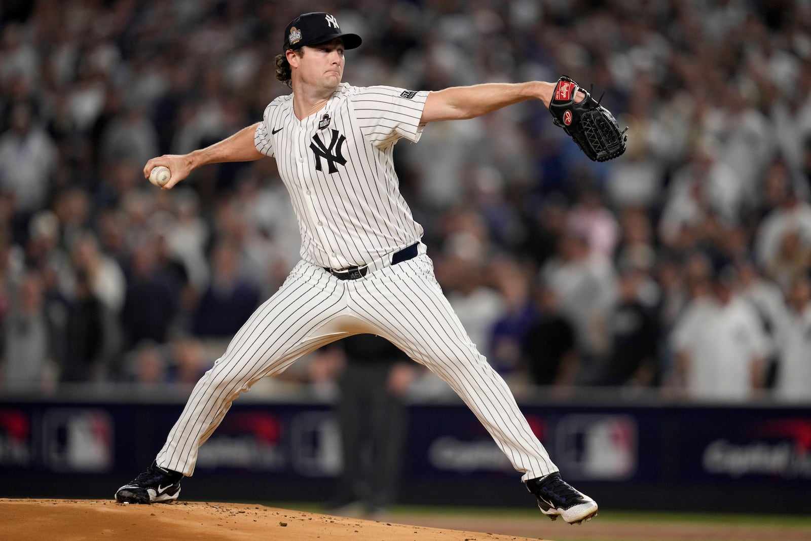 New York Yankees pitcher Gerrit Cole throws against the Los Angeles Dodgers during the first inning in Game 5 of the baseball World Series, Wednesday, Oct. 30, 2024, in New York. (AP Photo/Ashley Landis)