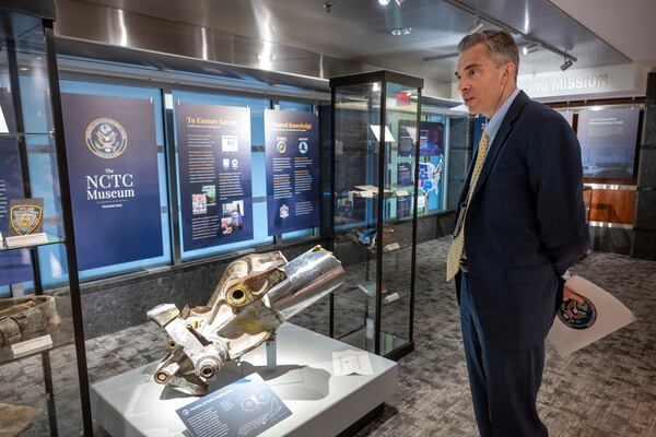 Acting Director of the National Counterterrorism Center Brett Holmgren walks through the National Counterterrorism Center Museum, Jan. 8, 2025 in McLean, Va. (AP Photo/Kevin Wolf)