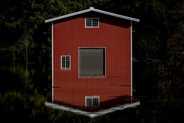 A partially submerged structure stands in floodwaters near Mays Canyon after a major storm in Guerneville, Calif., Saturday, Nov. 23, 2024. (Stephen Lam/San Francisco Chronicle via AP)