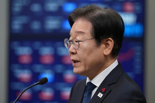 South Korea's main opposition Democratic Party leader Lee Jae-myung speaks during a press conference on removal of President Yoon Suk Yeol from office, at the party office at the National Assembly building in Seoul, South Korea, Sunday, Dec. 15, 2024. (AP Photo/Lee Jin-man)