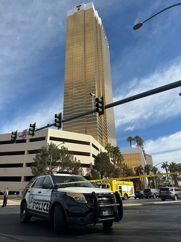 Police block the area after a vehicle caught fire and exploded outside the lobby of President-elect Donald Trump's hotel Wednesday, Jan. 1, 2025. (AP Photo/Ty ONeil)