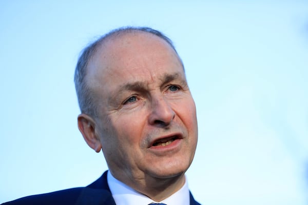 Micheal Martin, Tanaiste of Ireland and leader of Fianna Fail speaks to the media during a visit to St Seton's Secondary School in Ballyfermot, Dublin, Ireland, Tuesday, Nov. 26, 2024. (AP Photo/Peter Morrison)