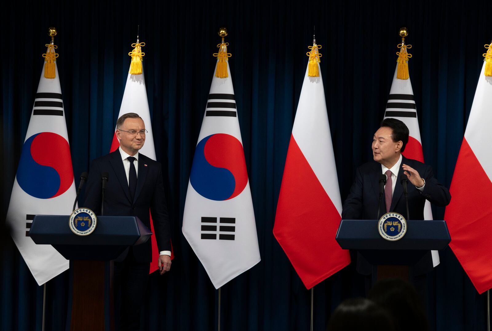 South Korean President Yoon Suk Yeol, right, and Poland's President Andrzej Duda, left, speak during a joint press conference at the Presidential Office in Seoul, South Korea, Thursday, Oct. 24, 2024. (Jeon Heon-Kyun/Pool Photo via AP)