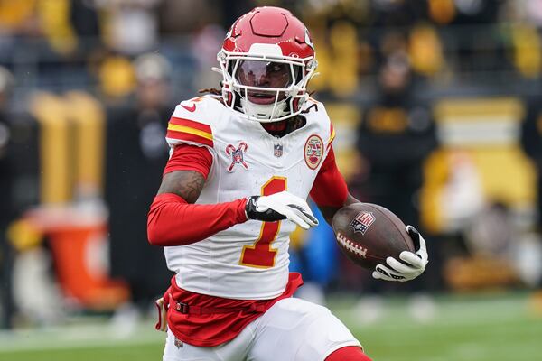 Kansas City Chiefs wide receiver Xavier Worthy (1) runs against the Pittsburgh Steelers during the first half of an NFL football game, Wednesday, Dec. 25, 2024, in Pittsburgh. (AP Photo/Matt Freed)