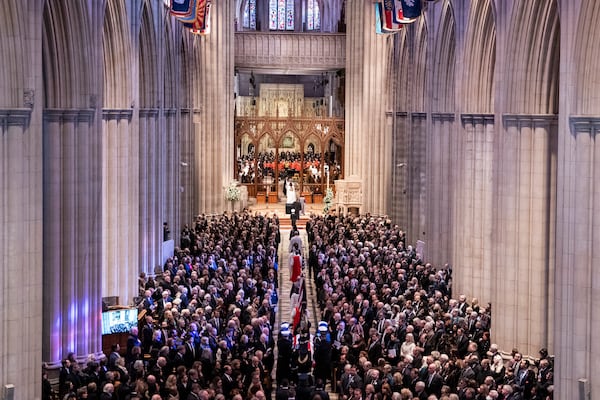 The casket of former President Jimmy Carter arrives for a state funeral at the National Cathedral, Thursday, Jan. 9, 2025, in Washington. (Haiyun Jiang/The New York Times via AP, Pool)