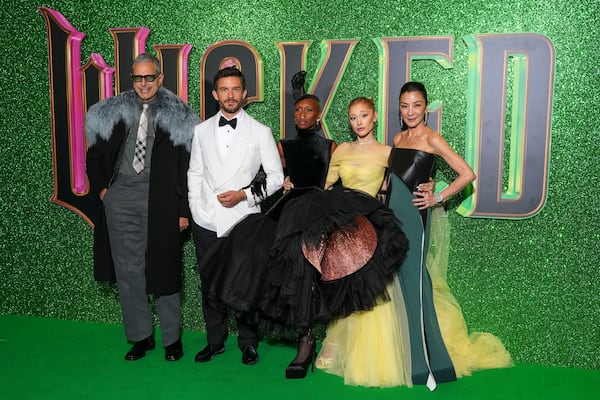 Jeff Goldblum, from left, Jonathan Bailey, Cynthia Erivo, Ariana Grande and Michelle Yeoh pose for photographers upon arrival at the premiere of the film 'Wicked' on Monday, Nov. 18, 2024, in London. (Photo by Scott A Garfitt/Invision/AP)