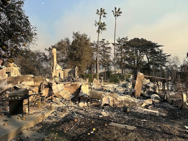 In this photo provided by Darin Bresnitz, a grill is among the remnants of the burned home of him and his wife, Anna Yeager, on Thursday, Jan. 9, 2025, after a fire swept through their Altadena, Calif., neighborhood. (Darin Bresnitz via AP)