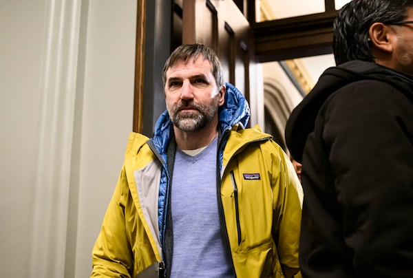 Minister of Environment and Climate Change Steven Guilbeault makes his way to a Liberal Party caucus meeting in West Block on Parliament Hill, in Ottawa, Wednesday, Jan. 8, 2025. (Sean Kilpatrick/The Canadian Press via AP)