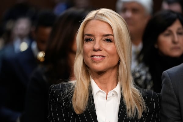 Pam Bondi, President-elect Donald Trump's choice to lead the Justice Department as attorney general, appears before the Senate Judiciary Committee for her confirmation hearing, at the Capitol in Washington, Wednesday, Jan. 15, 2025. (AP Photo/Ben Curtis)