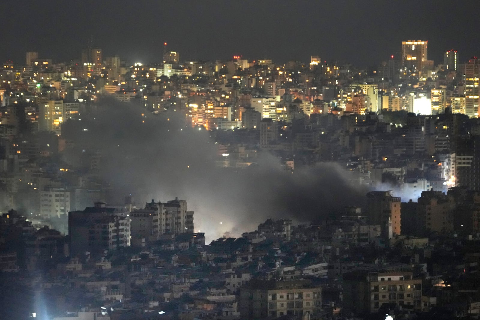 Smoke rises from an Israeli airstrike on Dahiyeh in the southern suburb of Beirut, Lebanon, Sunday, Oct. 20, 2024. (AP Photo/Hussein Malla)