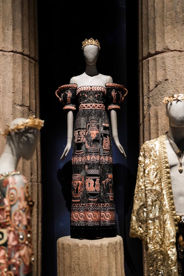 Creations are displayed during the exhibition "From the Heart to the Hands: Dolce&Gabbana" at the Grand Palais, in Paris, Thursday, Jan. 9, 2025. (AP Photo/Thibault Camus)