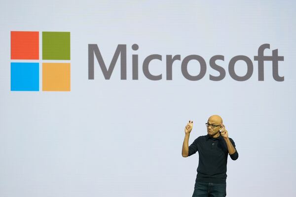 Microsoft CEO Satya Nadella addresses attendees at the Microsoft Ignite conference Tuesday, Nov. 19, 2024, in Chicago. (AP Photo/Charles Rex Arbogast)