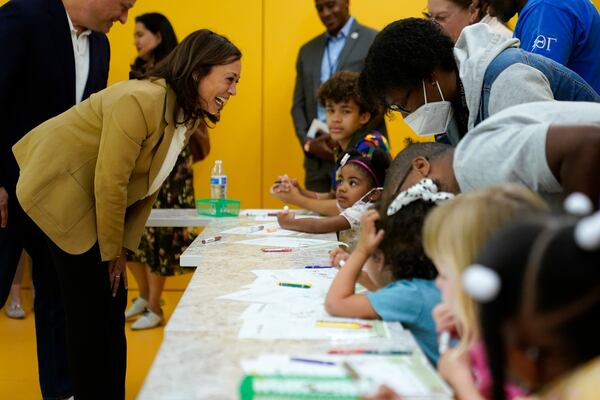 FILE - Vice President Kamala Harris visits with families for a celebration of Juneteenth at the National Museum of African American History and Culture, June 20, 2022, in Washington. (AP Photo/Patrick Semansky, File)