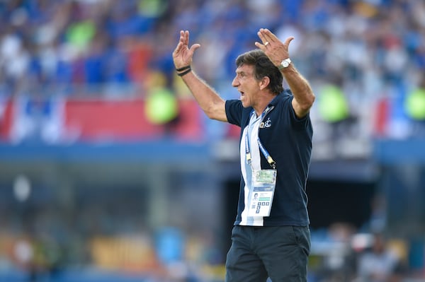 Coach Gustavo Costas of Argentina's Racing Club reacts during the Copa Sudamericana final soccer match against Brazil's Cruzeiro in Asuncion, Paraguay, Saturday, Nov. 23, 2024. (AP Photo/Gustavo Garello)