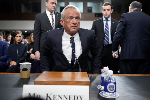 Robert F. Kennedy Jr., President Donald Trump's choice to be Secretary of Health and Human Services, arrives to appear before the Senate Finance Committee for his confirmation hearing, at the Capitol in Washington, Wednesday, Jan. 29, 2025. (AP Photo/Ben Curtis)