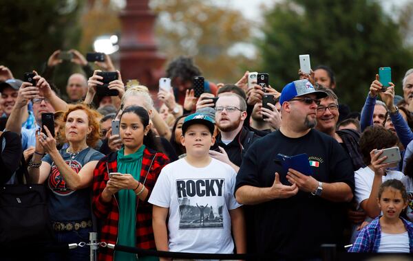 FILE - Fans gather near a press conference where cast members Michael B. Jordan, Sylvester Stallone and Tessa Thompson are promoting their film "Creed" outside the Philadelphia Museum of Art, Friday, Nov. 6, 2015, in Philadelphia. (AP Photo/Matt Slocum)