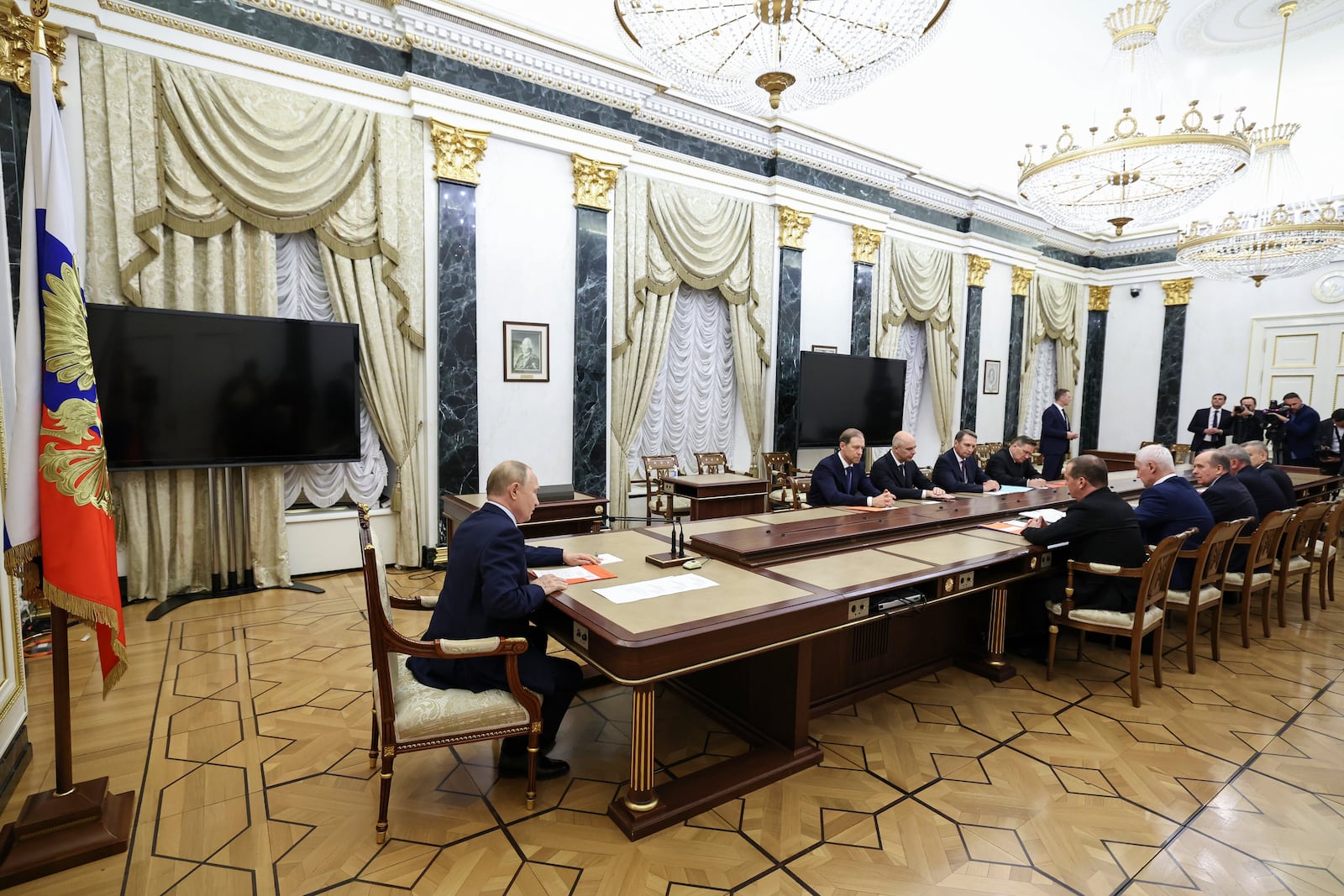 FILE - Russian President Vladimir Putin, left, speaks at the Security Council meeting on nuclear deterrence at the Kremlin in Moscow, Russia, on Sept. 25, 2024. (Alexander Kazakov, Sputnik, Kremlin Pool Photo via AP, File)