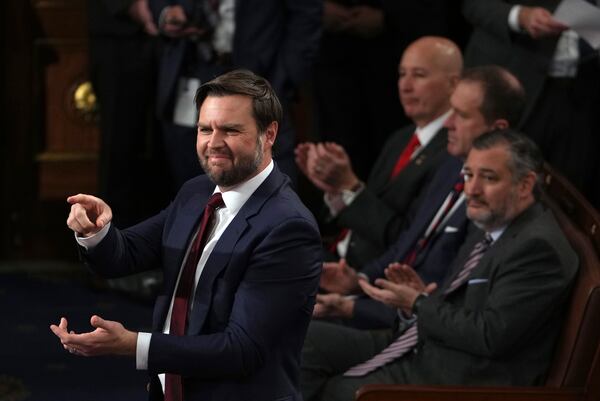 Vice President-elect JD Vance smiles after the certification for Ohio is read during a joint session of Congress to confirm the Electoral College votes, affirming President-elect Donald Trump's victory in the presidential election, Monday, Jan. 6, 2025, at the U.S. Capitol in Washington. (AP Photo/Matt Rourke)