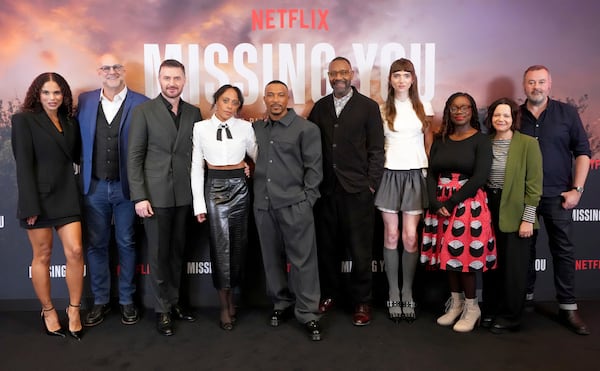 Harlan Corben, second from left, poses for photographers with cast members at a photo call for the television series Missing You, Wednesday, Nov. 6, 2024, in London. (AP Photo/Kirsty Wigglesworth)