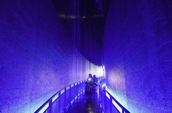 Visitors walks at the Tsunami Museum in Banda Aceh, Aceh province, Indonesia, Saturday, Dec 14, Dec. 15, 2024. (AP Photo/Achmad Ibrahim)